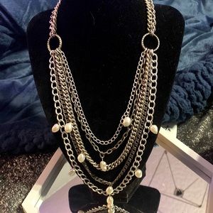 Silver necklace with scattered pearls